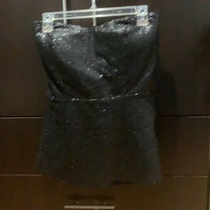 A black sequins corset.